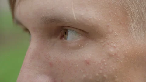 Man with reflective facial expression, Young man with pensive look outdoors Stock Footage 325528054