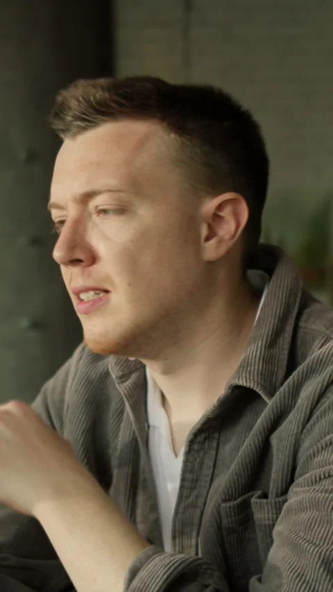 A man reflects on life through interactions and solitude in a video Stock Footage 319605817