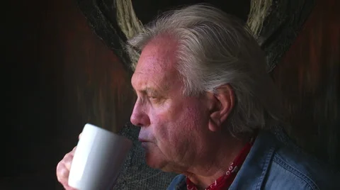 Man reflects while looking out window Stock Footage 45433581