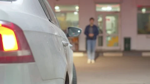 A man refueling a car Stock Footage 128829103
