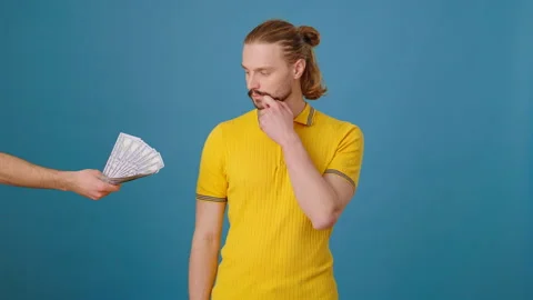 Man refuses large amount of offered money cash showing honesty Stock Footage 263322168