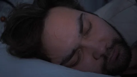 A man refuses to wake up during self-isolation due to coronavirus quarantine. Stock Footage 127710946