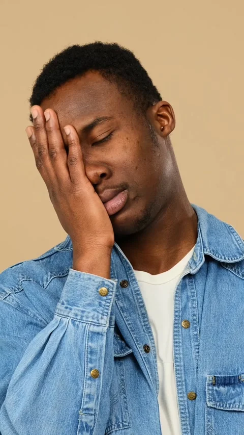 Man regretting wrongdoing over green background Stock Footage 318220877