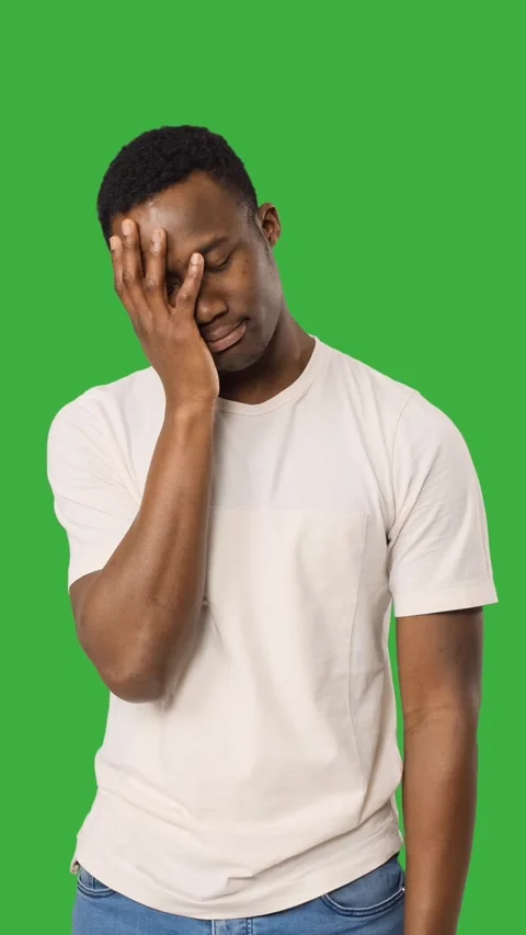 Man regretting wrongdoing over green background Stock Footage 318220924