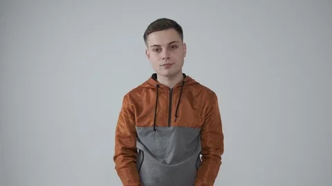 Man regretting wrongdoing over white background Stock Footage 126044757