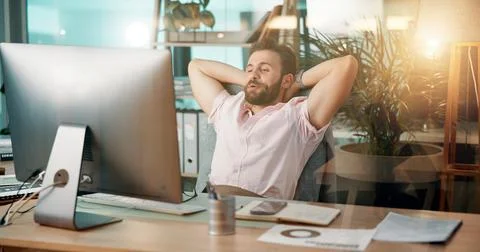 Man, relax or computer with rest for done, finished tasks or job completion at Foto stock
