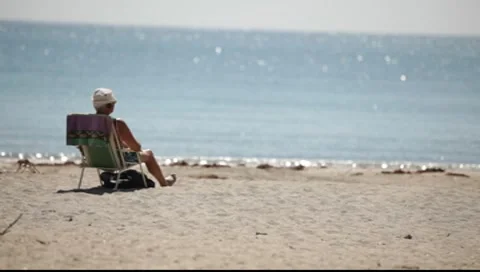 Man Relaxes on the Beach 스톡 동영상 7132396