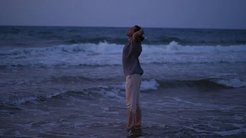 Man relaxing close eyes enjoy sea and wind Stock Footage 104824587