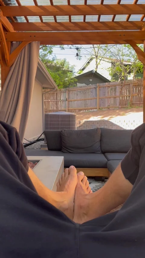 Man relaxing on Hamock 2 Stock Footage 236259826