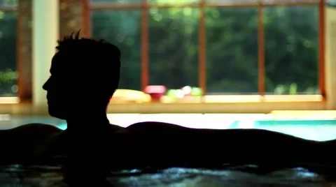 Man Relaxing In Jacuzzi Spa 動画素材 68811701