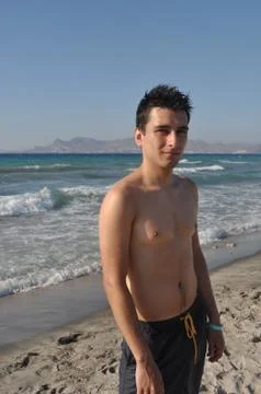 Man relaxing at kos beach Stock Photos