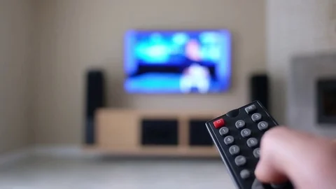 A man with a remote control Stock Footage 81778319