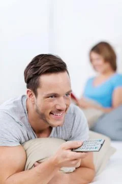 Man with a remote control Stock Photos