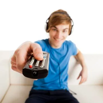 Man with a remote control Stock Photos