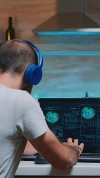 Man remote thief stealing data from company hacking system Stock Photos