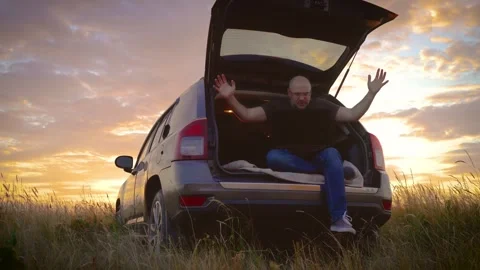 Man remotely working on laptop computer grabs his head when commits irreparable Video stock 245444683