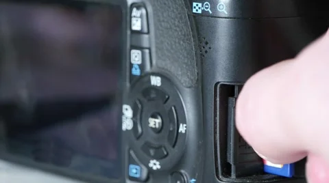 Man Remove The Card From The Camera Stock Footage 49758727