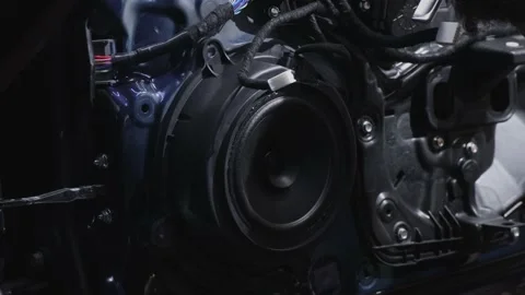 Man removes loud speaker to replace for better model device Stock Footage 197095437