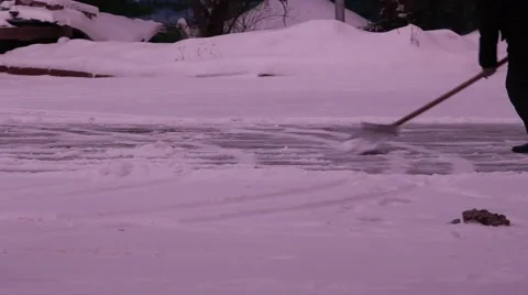 Man removes snow shovel iron  Stock Footage 59144873