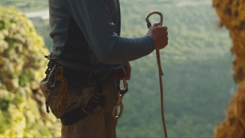 Man Removing Rope From Harness Stock Footage 275489712