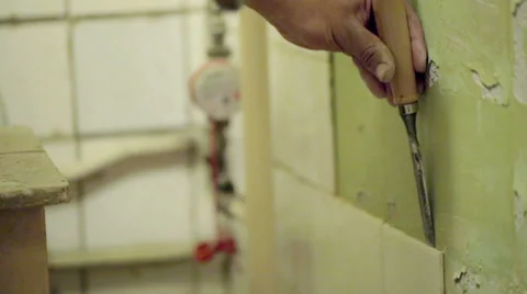 Man removing tile Stock Footage 39156607