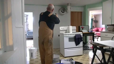 A man renovating an old house. Stock Footage 167569155