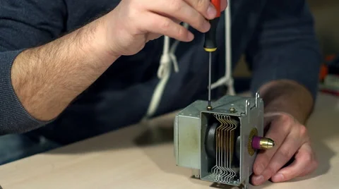Man repairing broken device in workshop 스톡 동영상 68849873