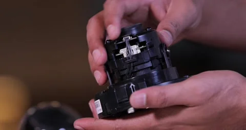 A man repairing CCTV camera in service center Stock Footage 146728663