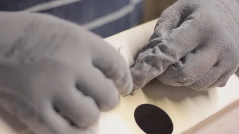 Man repairing plastic with razor Stock-Footage 129023030