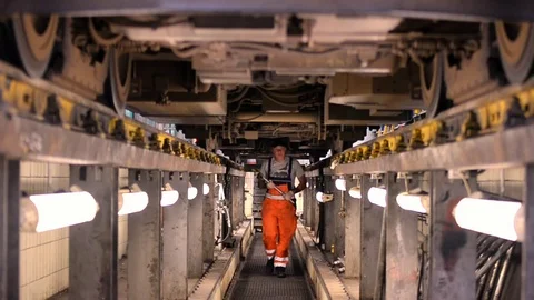 A man repairing a train Stock Footage 76297767