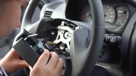 Man repairs the steering of a car 스톡 동영상 141307805