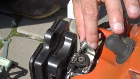 Man repairs a trimmer Video stock 138682134