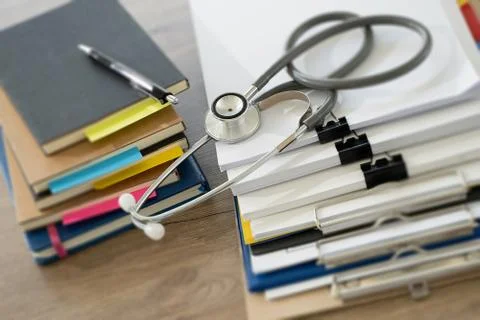 Man report stack paper folder close up stacking of office working document wi Stock Photos