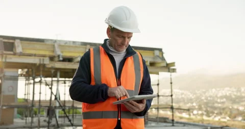 Man, research and construction worker on site with tablet for update on Stock Footage 342768151