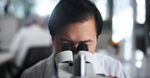 Man, research or scientist with microscope for forensic study or new discovery Stock Photos