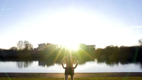 Man resting after long run, runner sitting down and catching breath  Stock Footage 85658489
