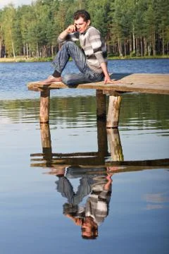 Man resting in a park Stock Photos