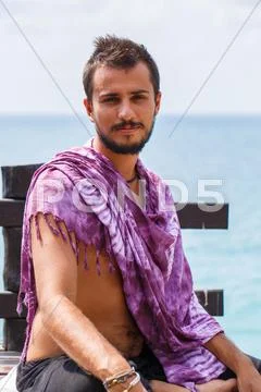 Man resting on the sea Stock Photos