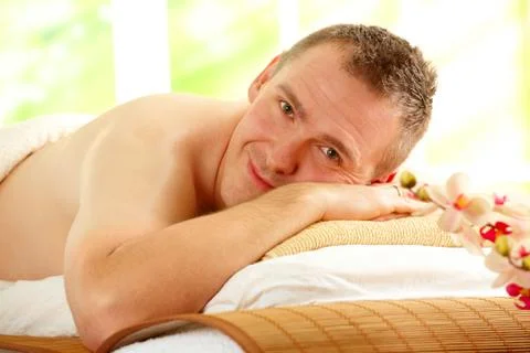 Man resting in spa salon Stock Photos