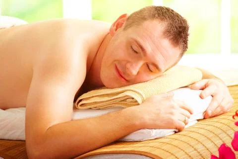 Man resting in spa salon Stock Photos