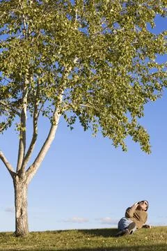Man Resting Under Tree Stock Photos