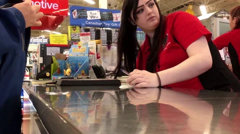 Man returning heater at customer service counter inside Canadian tire store Stock Footage 68516255