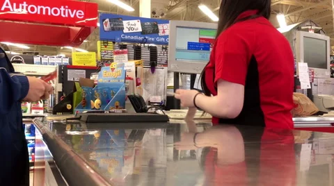 Man returning heater at customer service counter inside Canadian tire store Video stock 68517612