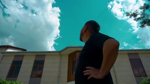 A man returns to the clouds of heaven Stock Footage 253109024