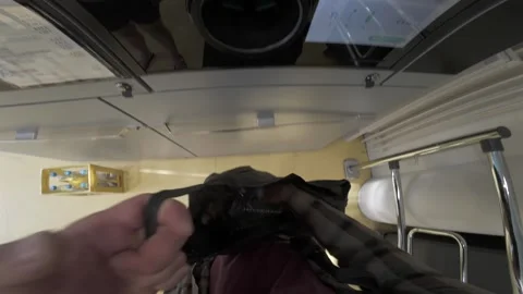 Man returns empty beverage containers into a modern reverse vending machine 库存影片 340894060