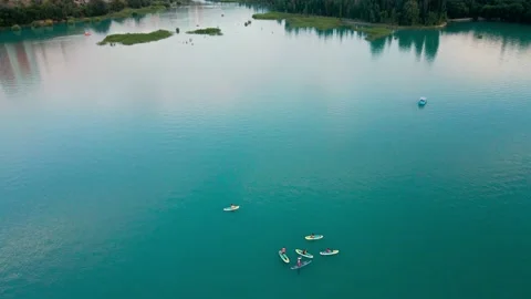 Man ride on SUP board in the mountain lake Stock-Footage 204010629