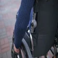 The man ride a wheelchair. Slow motion 4k or 4k+ Resolution