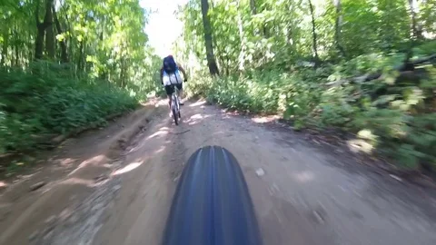 Man rides a bicycle in the woods Stock Footage 71716539