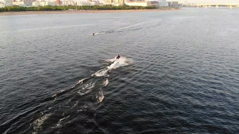 Man rides a jet ski Stock Footage 128709349