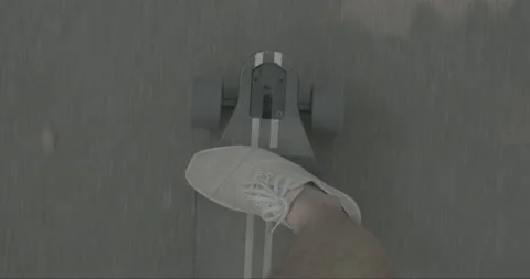 A man rides a longboard in the park Video stock 160006799